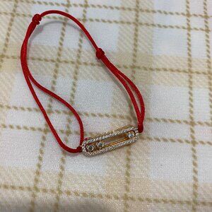 This Messika Cord Features A Long Gold Ribbon In The Center, Studded With Sparkl